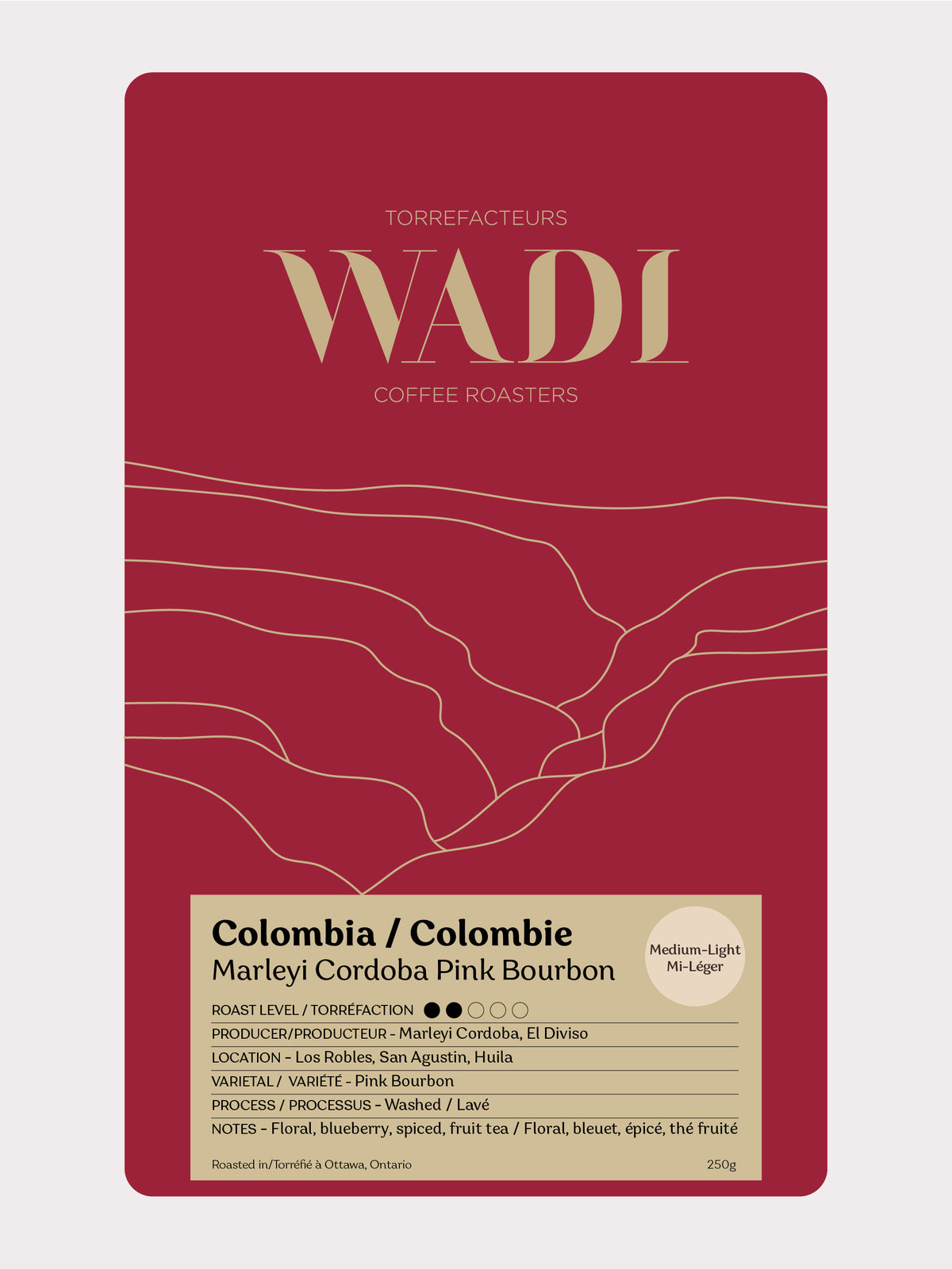 Colombia Marleyi Córdoba Pink Bourbon coffee beans from Wadi Coffee Roasters in a bag with colorful label and branding.
