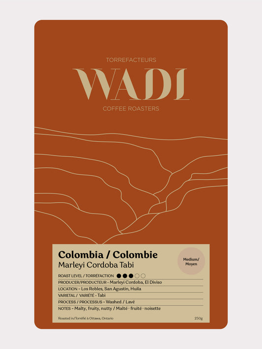 Colombia Marleyi Córdoba Tabi coffee bag from Wadi Coffee Roasters, featuring vibrant branding and a resealable bag design.